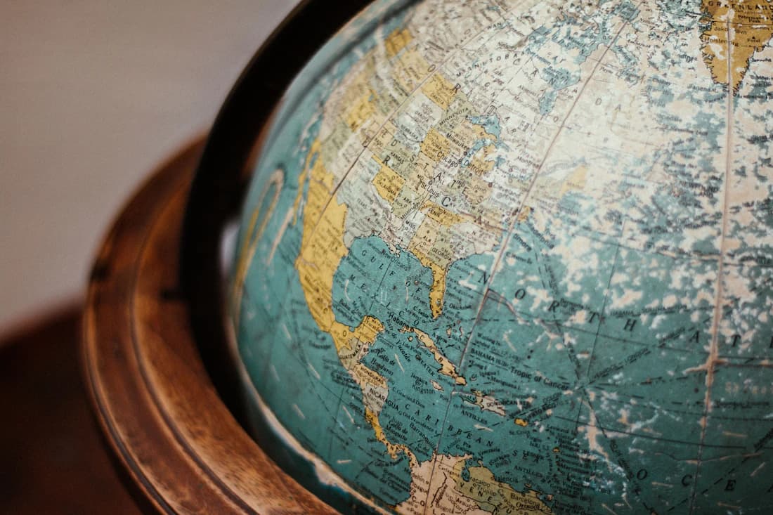 An antique desk globe, payments accepted from anywhere.