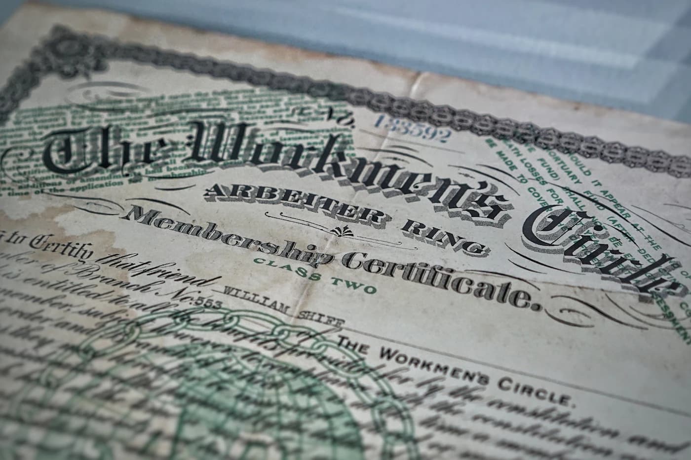 Fine print on a vintage stock certificate.