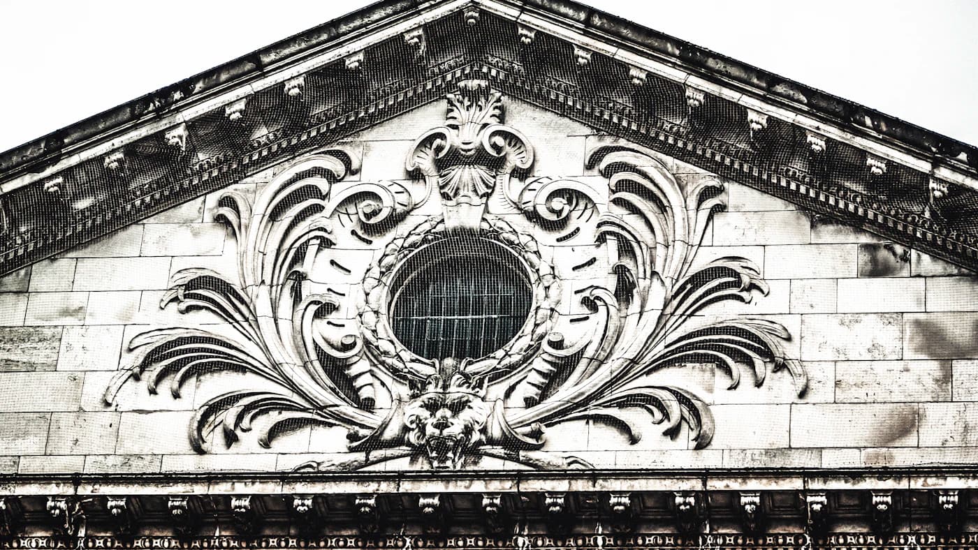 An ornate embossed stone facade.
