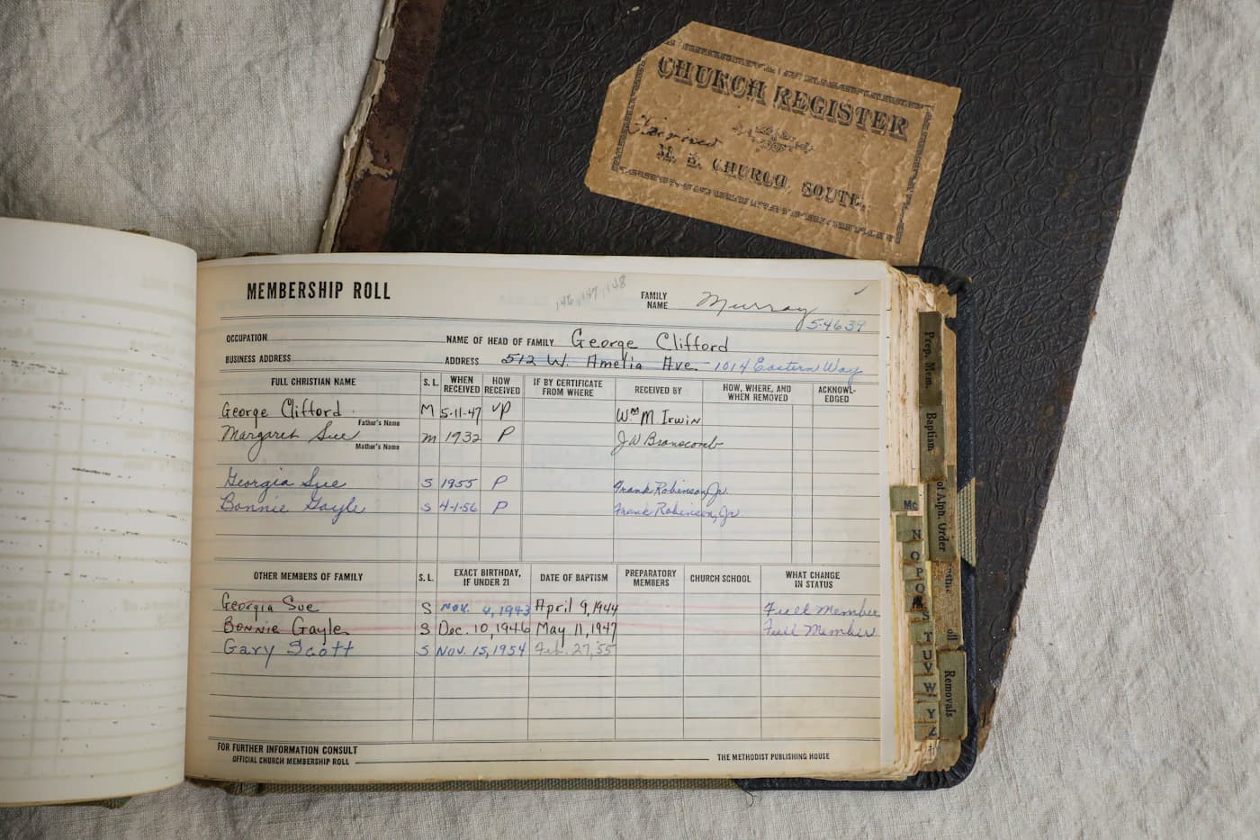 A calculator and accounting documents organized on a clean desk.