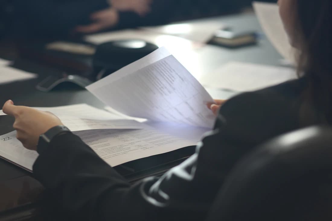 A representative reviewing case papers ahead of an appeal.