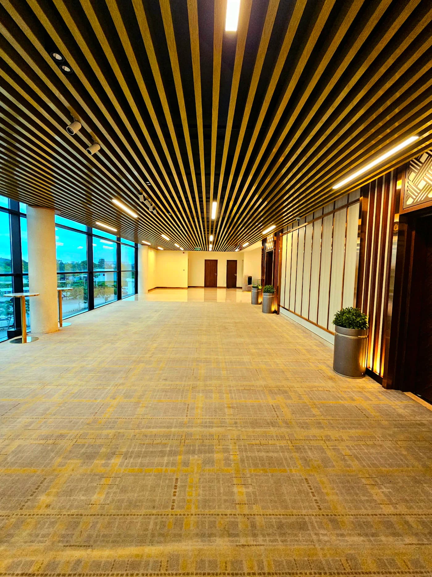The interior lobby of a luxury commercial office building.