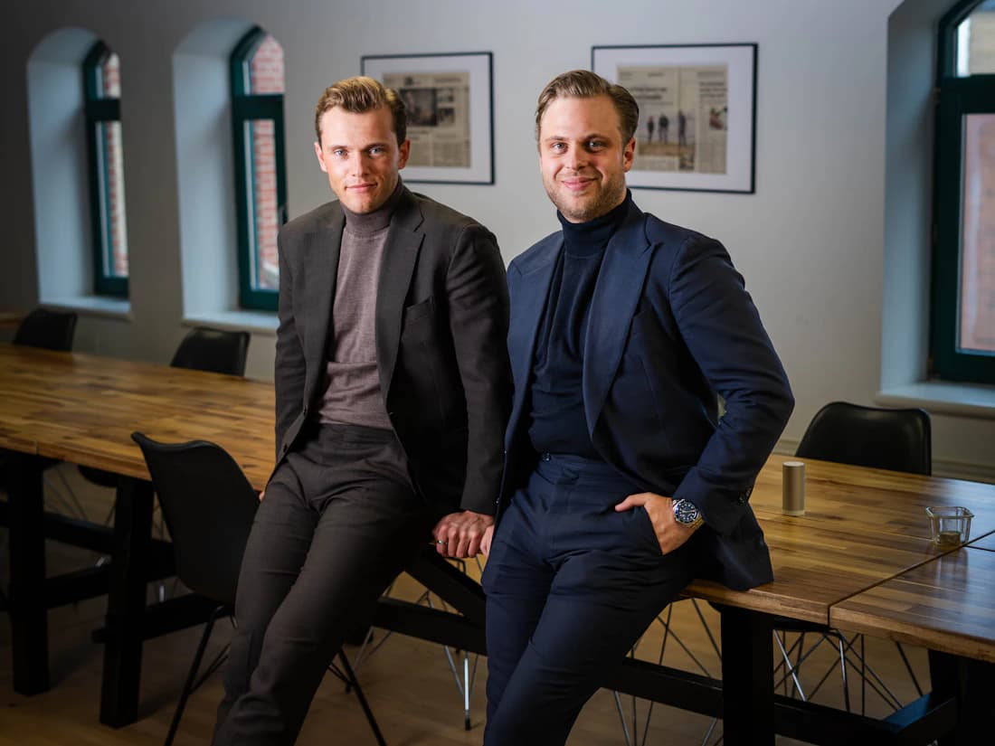 Two founders in their office, the team an EIN lets you hire.