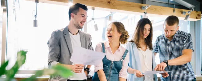 Group of people happy to raise capital for their startup